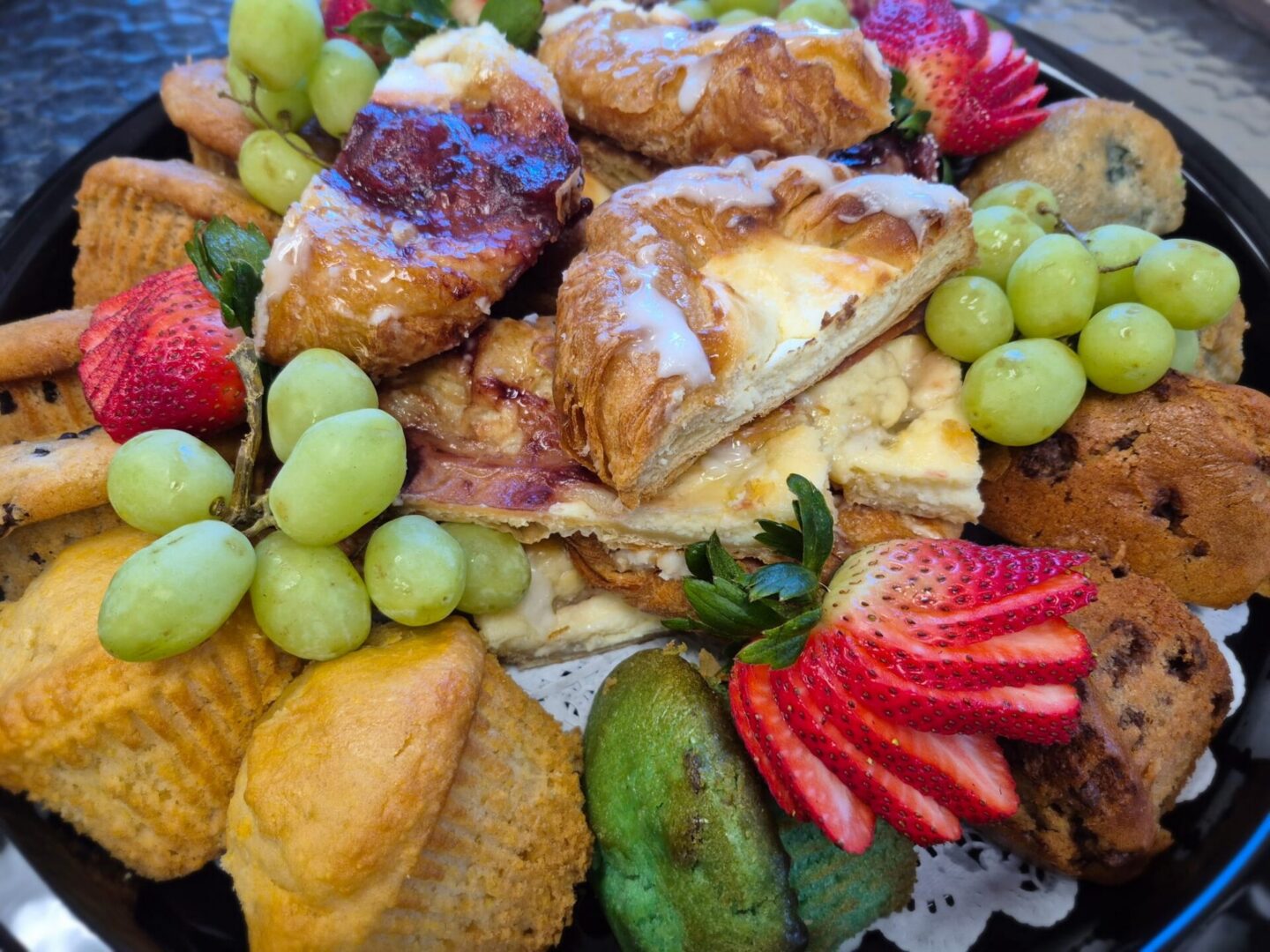 Delicious breakfast pastries with fresh fruits