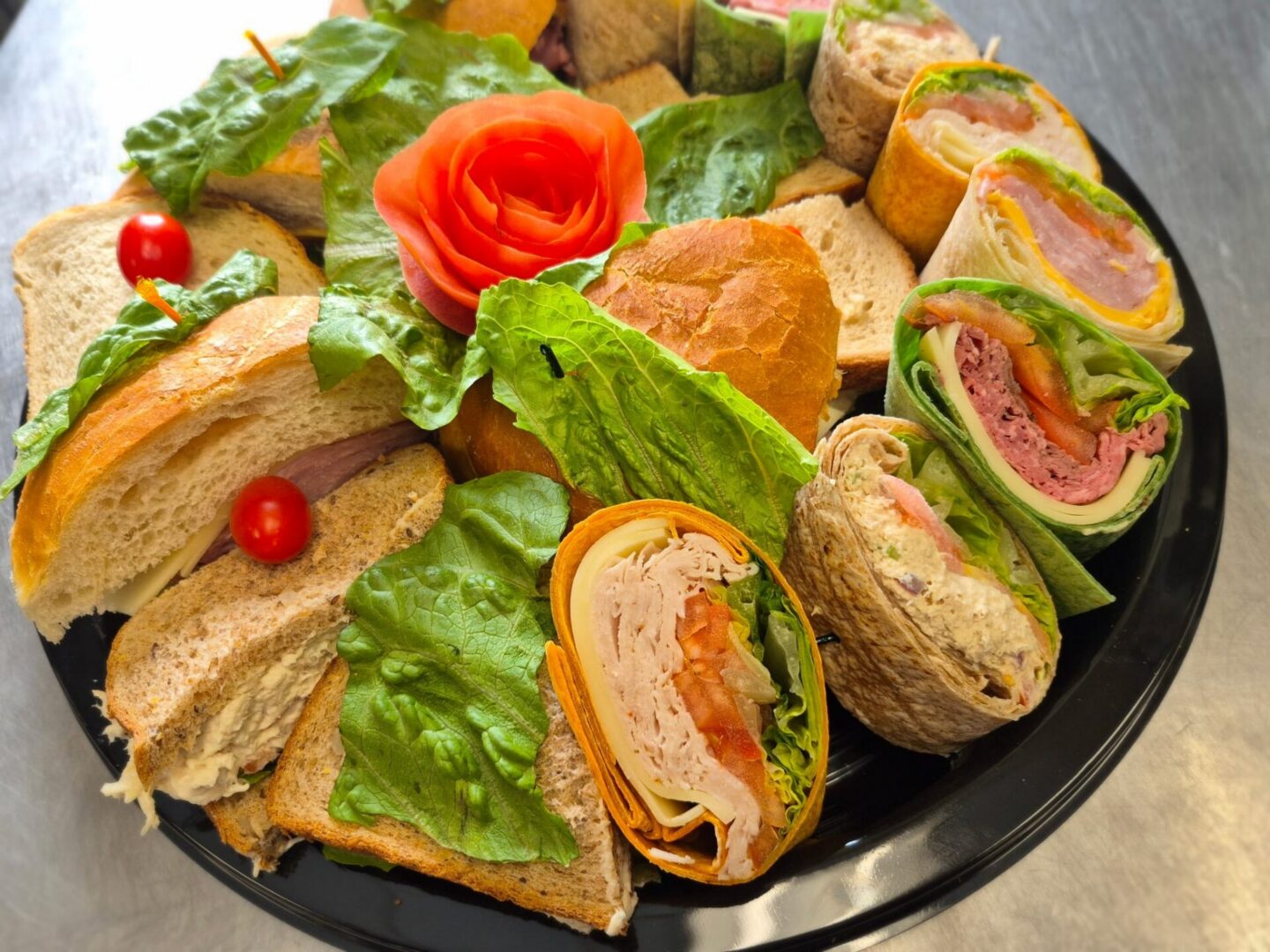 Variety of wraps and sandwiches on plate