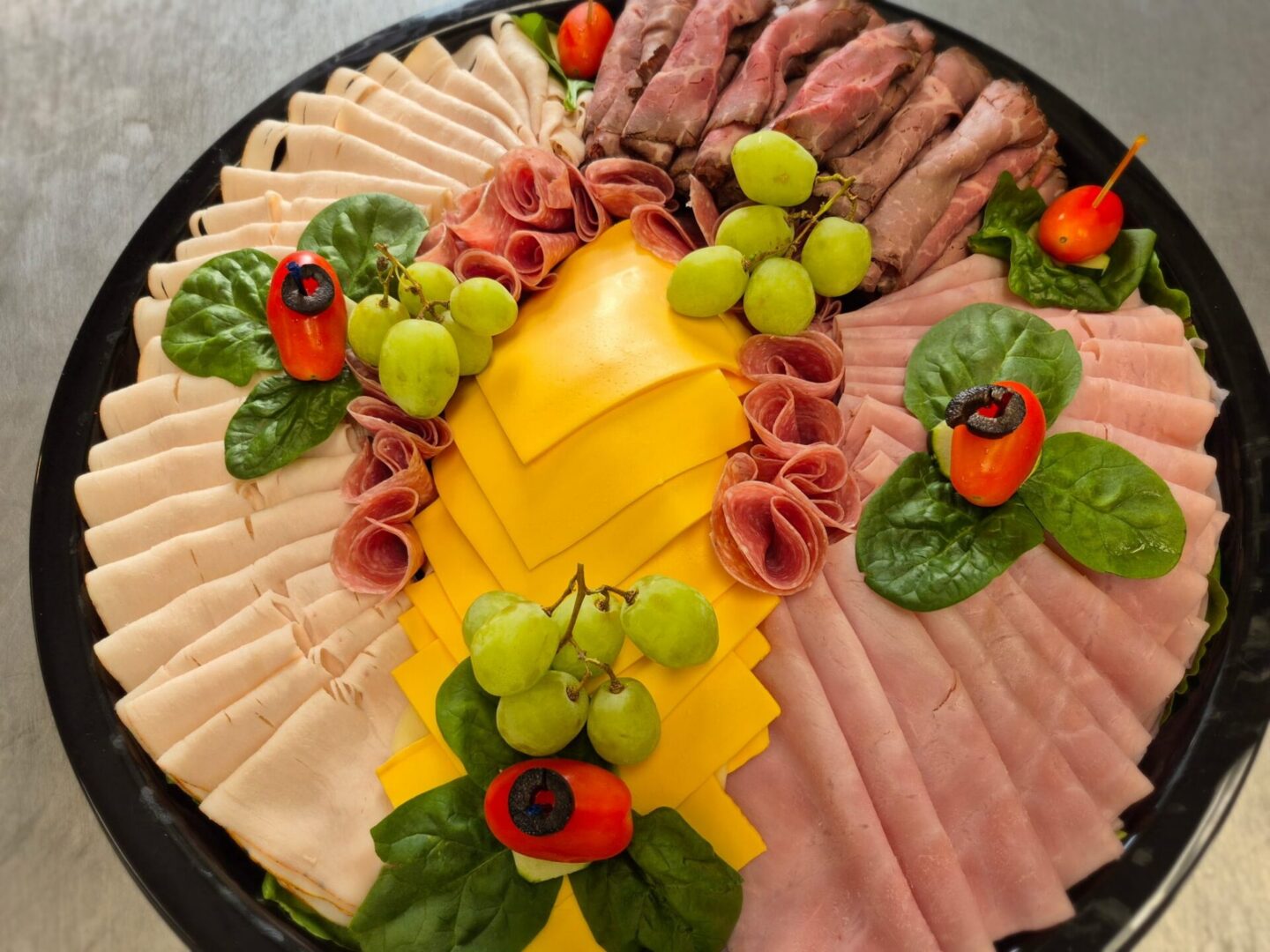 Deli platter with meats and cheese