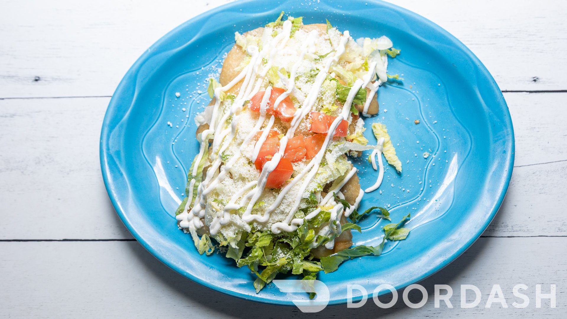 Taco salad on blue plate